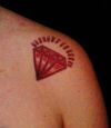diamond tattoo on shoulder